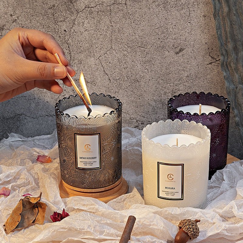 scented candle on bedside table in calm bedroom