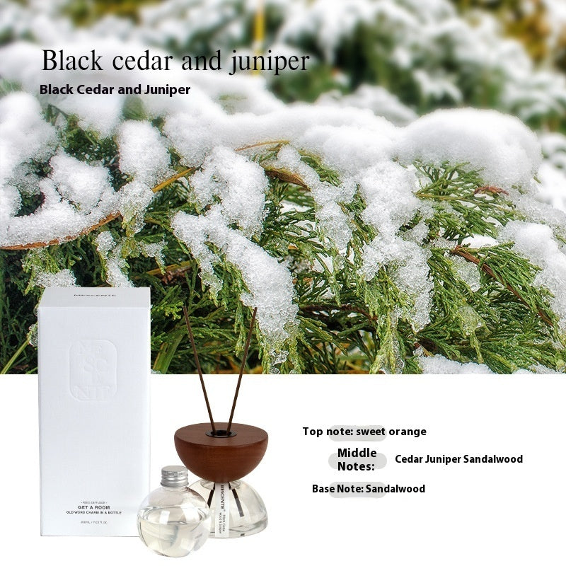 Decorative hourglass essential oil diffuser in soft neutral bedroom aesthetic
