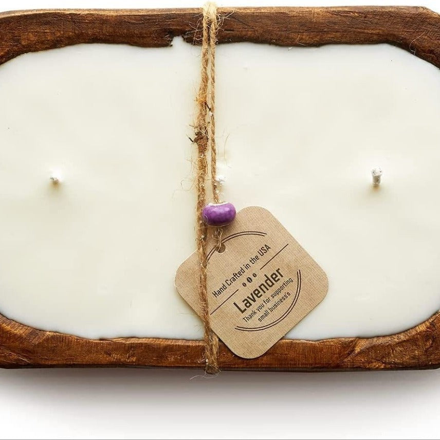handmade lavender scented soy candle in rustic wooden bowl decor